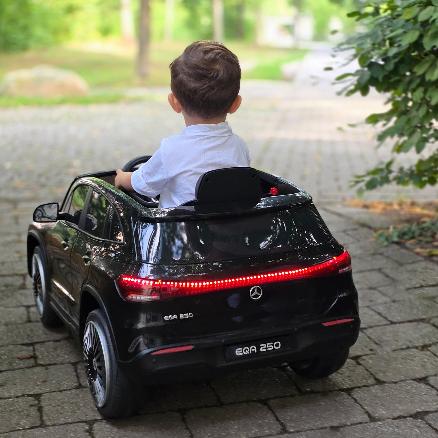 Electric Ride-On Toy Car for Kids Ages 3-8 with Remote Control, Headlights and Horn, Black