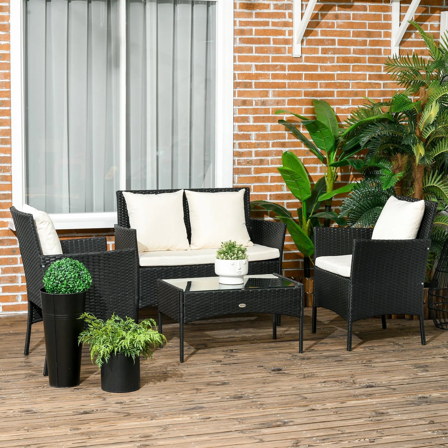 4‑Piece Rattan Lounge Set with Sofa & Coffee Table